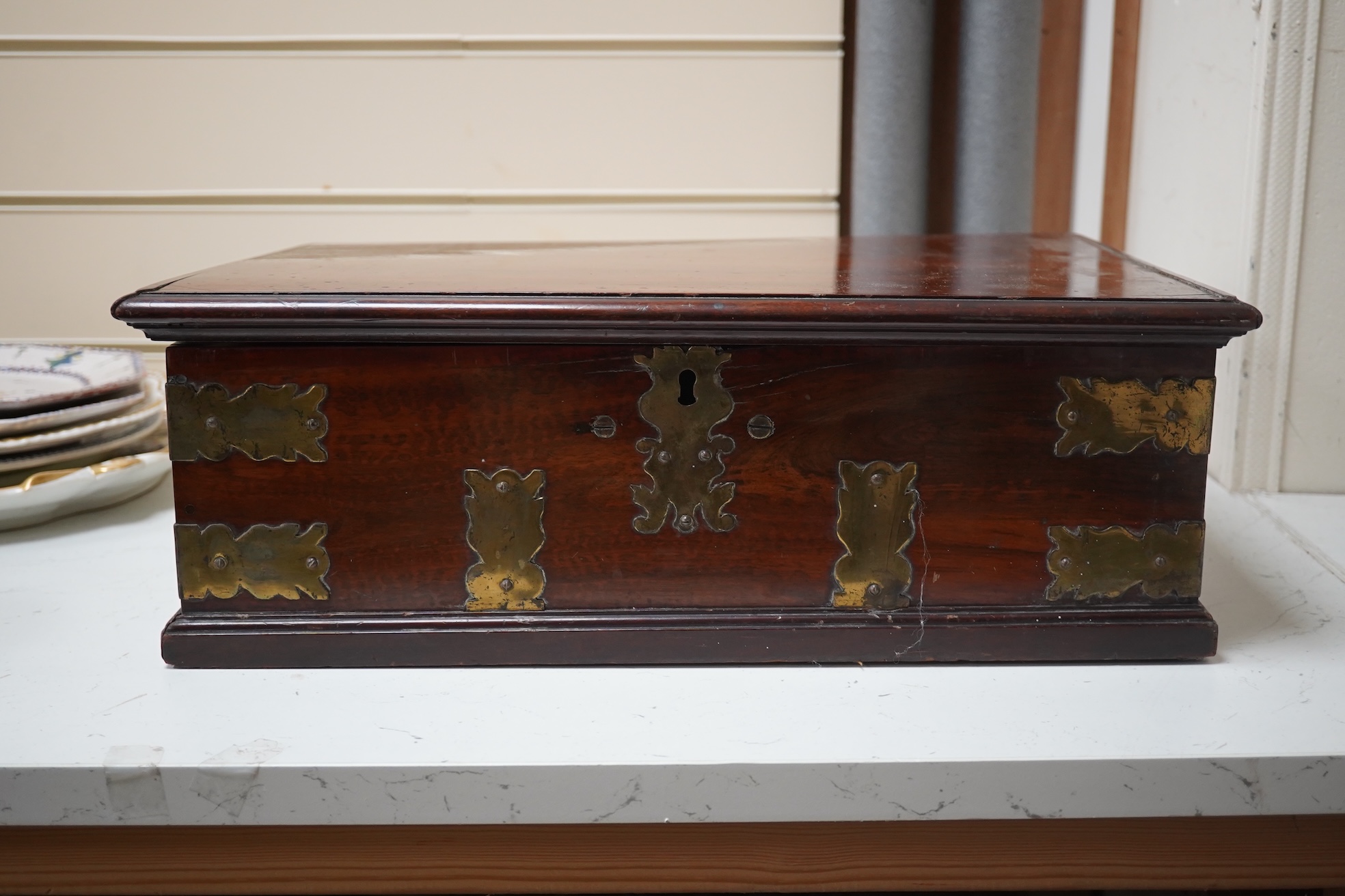 A late 18th century Indo-colonial brass mounted padouk wood casket, 43cm wide. Condition - good for age